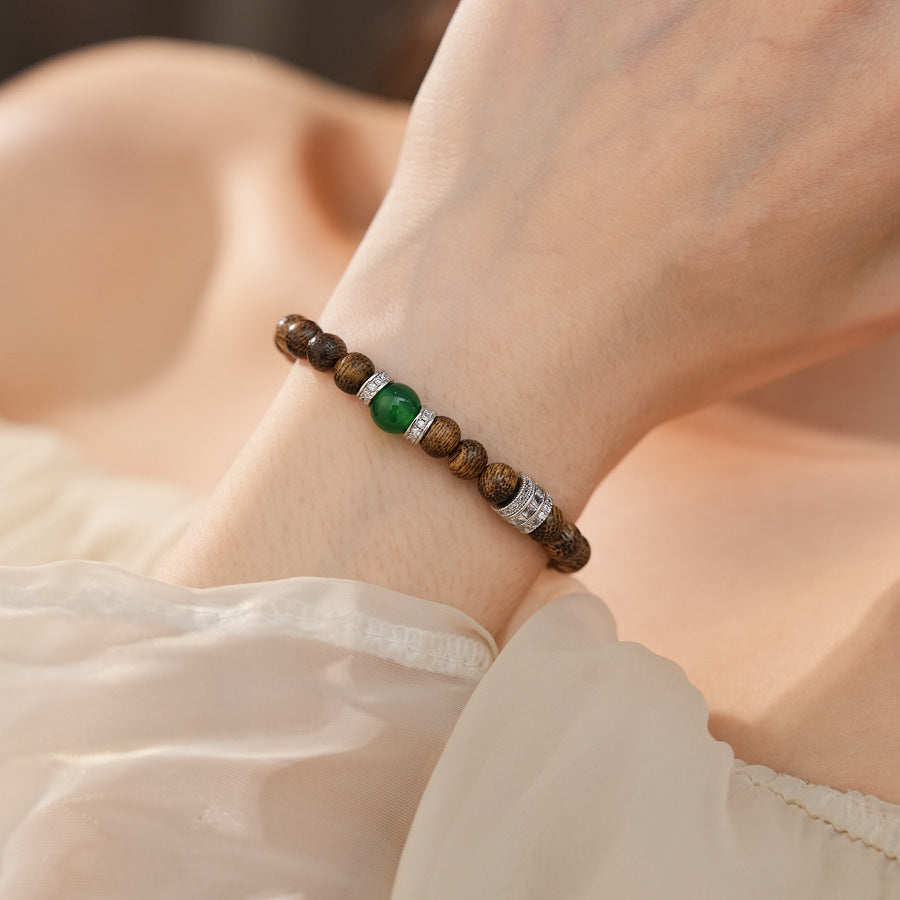Natural agarwood beaded bracelet with green agate centerpiece and pavé spacers — Verdant Agarwood Bracelet by Glazenya.