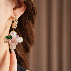 Romantic floral statement earrings with pink blossoms, imitation pearls, and enamel petals — Blossom Pearl Garden Earrings.