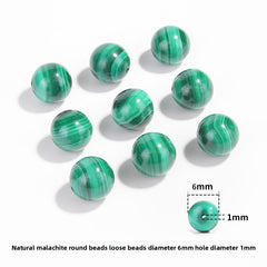 Malachite round beads with green banded “peacock” patterns, polished, assorted 4–12 mm — Peacock Veins.