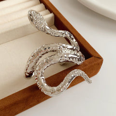 Serpent Luxe Cuff bracelet in gold and silver with rhinestone snake design