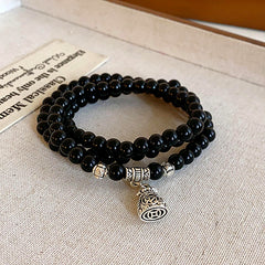 Multi-layer bracelet with crystal medallion and pearl beads in chic style