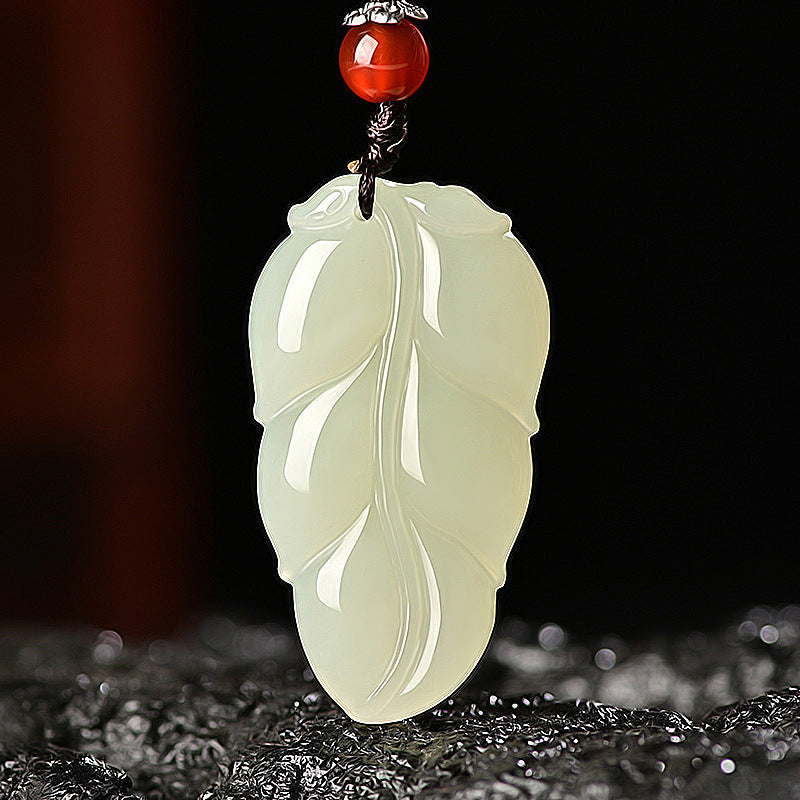 Hetian (nephrite) white jade leaf pendant close-up – Golden Bough, 38×21×8 mm