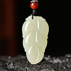 Hetian (nephrite) white jade leaf pendant close-up – Golden Bough, 38×21×8 mm