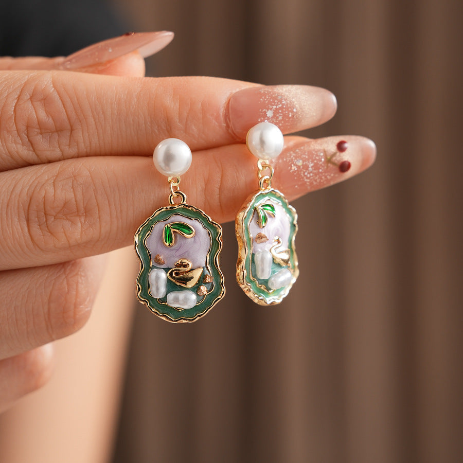Pearl stud drop earrings with lilac and green enamel cameo and gold accents — Verdant Cameo Pearl Enamel Drops.