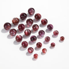 Lepidolite-in-Quartz crystal round beads with berry-pink striations, assorted 8–15 mm.