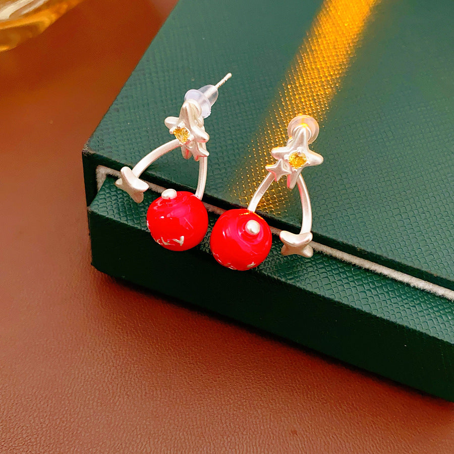 Lucky Star charm drop earrings with zircon accents in red and green