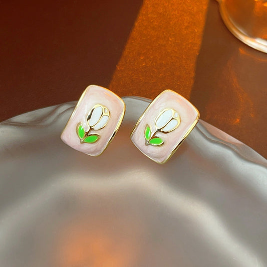 Blush-pink enamel rectangular studs with tulip motif and gold rim — Blush Tulip Cameo Studs.