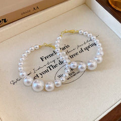 Glazenya Irregular Cross Pearl Choker — close-up of cross motif and pearls