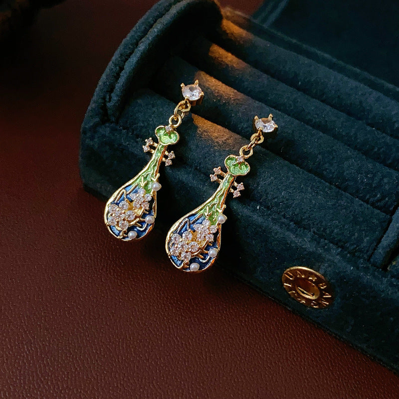 Gold-tone filigree drop earrings with green and blue enamel lute motifs, accented by zircons and tiny pearls — Verdant Lute Filigree Drops.