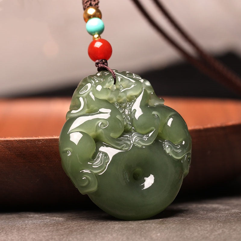 Hand-carved Hetian (nephrite) jade Pi Xiu pendant in glossy celadon green — Fortune Guardian Hetian Jade Pendant.