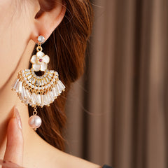 Floral fan chandelier earrings with layered crystal fringe and pearl drops — Blossom Fan Pearl Fringe Earrings.