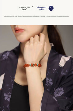 Collectible-grade Hetian jade bracelet with high-ice red agate centerpiece and turquoise accents — Crimson Serenity Hetian Jade Bracelet.