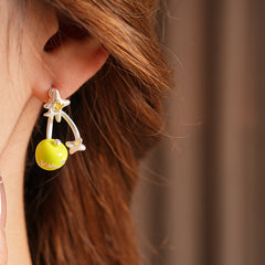 Lucky Star charm drop earrings with zircon accents in red and green