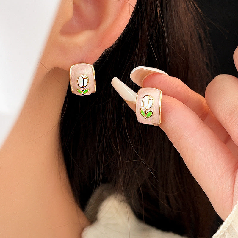 Blush-pink enamel rectangular studs with tulip motif and gold rim — Blush Tulip Cameo Studs.
