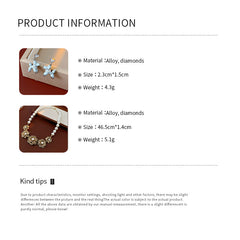 Silver-tone necklace and stud earrings with pastel blue balloon-dog charms — Blue Pup Pendant & Earrings Set.