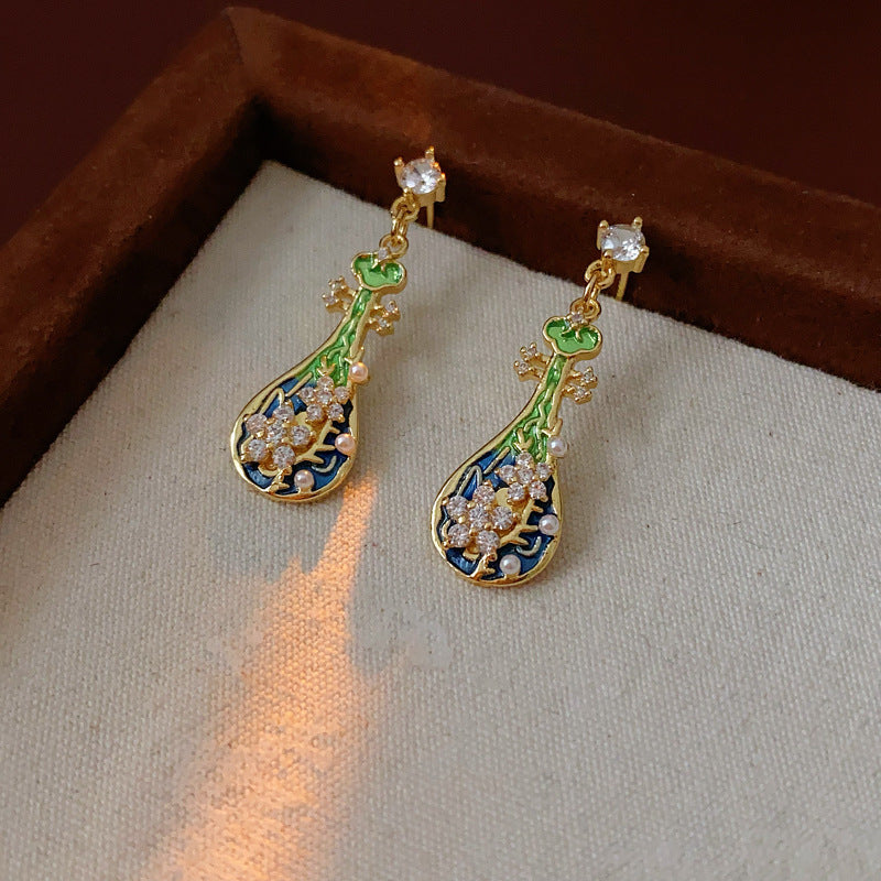 Gold-tone filigree drop earrings with green and blue enamel lute motifs, accented by zircons and tiny pearls — Verdant Lute Filigree Drops.