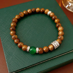 Natural agarwood beaded bracelet with green agate centerpiece and pavé spacers — Verdant Agarwood Bracelet by Glazenya.