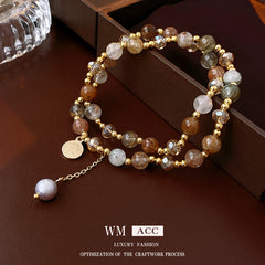 Multi-layer bracelet with crystal medallion and pearl beads in chic style