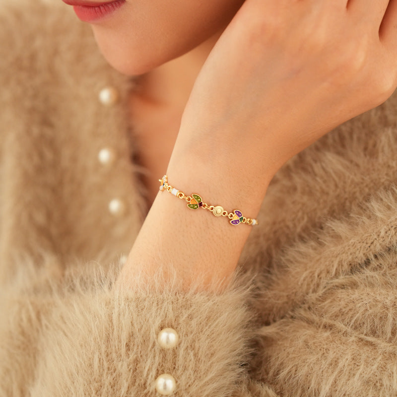 Product size chart for Vintage Enamel Floral Bracelet in golden alloy with enamel flowers