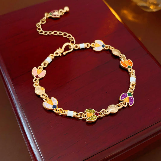 Product size chart for Vintage Enamel Floral Bracelet in golden alloy with enamel flowers