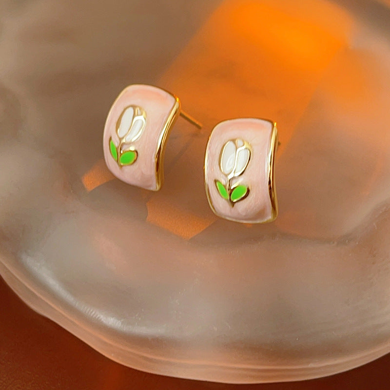 Blush-pink enamel rectangular studs with tulip motif and gold rim — Blush Tulip Cameo Studs.