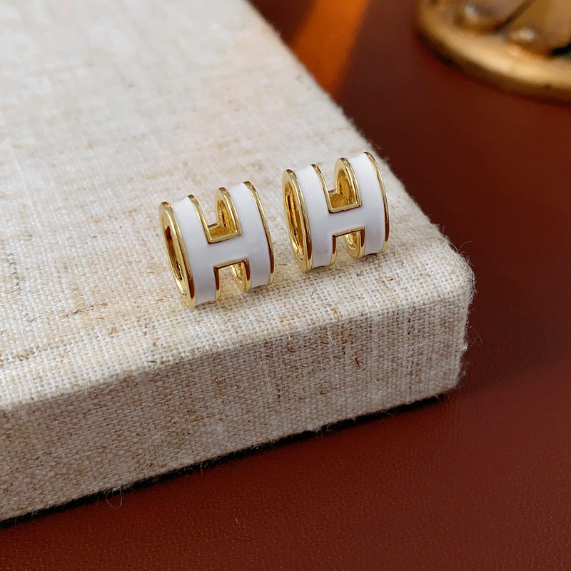 White enamel H letter earrings with gold trim, minimalist chic jewelry