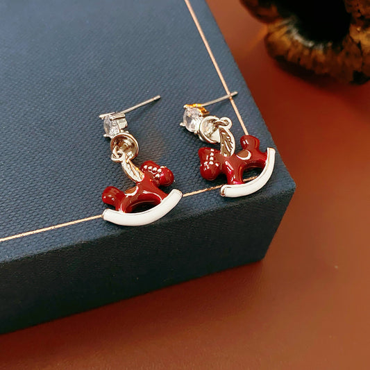 Enamel rocking-horse drop earrings with crystal stud — crimson pony and white rocker — Crimson Carousel Pony Drop Earrings.