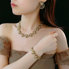 Vintage inspired lion medallion necklace and bracelet set in gold tone alloy with bold relief details