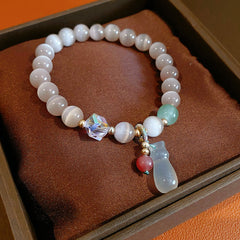 Pastel cat’s-eye and chalcedony beaded bracelet with frosted cat pendant — Moonlit Cat’s Eye Charm Bracelet by Glazenya.