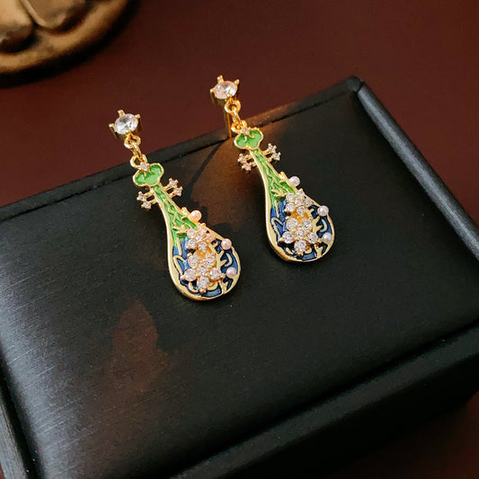 Gold-tone filigree drop earrings with green and blue enamel lute motifs, accented by zircons and tiny pearls — Verdant Lute Filigree Drops.