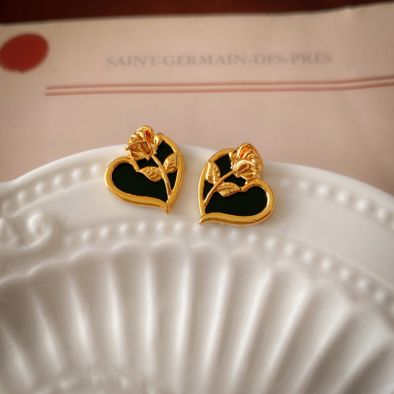 Camellia & Bow Earring Collection with black camellia, bow, pearl, and geometric designs – chic light luxury retro jewelry
