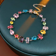 Iridescent Charm Bracelet in vivid multicolor zircon stones on silver-tone copper chain, elegant and lightweight luxury jewelry.