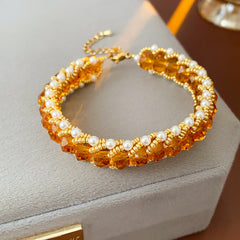 Braided glass-pearl and crystal bracelet with gold extender chain in Coffee Amber/Violet/Jade Green — Braided Pearl Crystal Bracelet.
