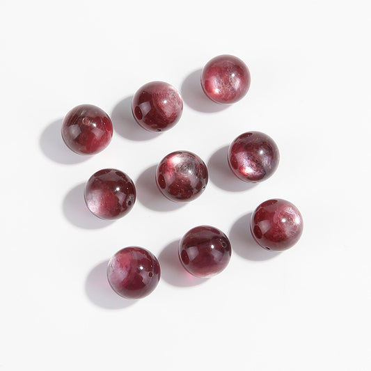Lepidolite-in-Quartz crystal round beads with berry-pink striations, assorted 8–15 mm.
