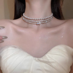 Glazenya Irregular Cross Pearl Choker — close-up of cross motif and pearls