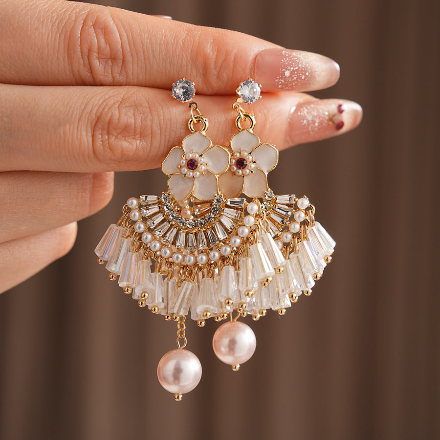 Floral fan chandelier earrings with layered crystal fringe and pearl drops — Blossom Fan Pearl Fringe Earrings.