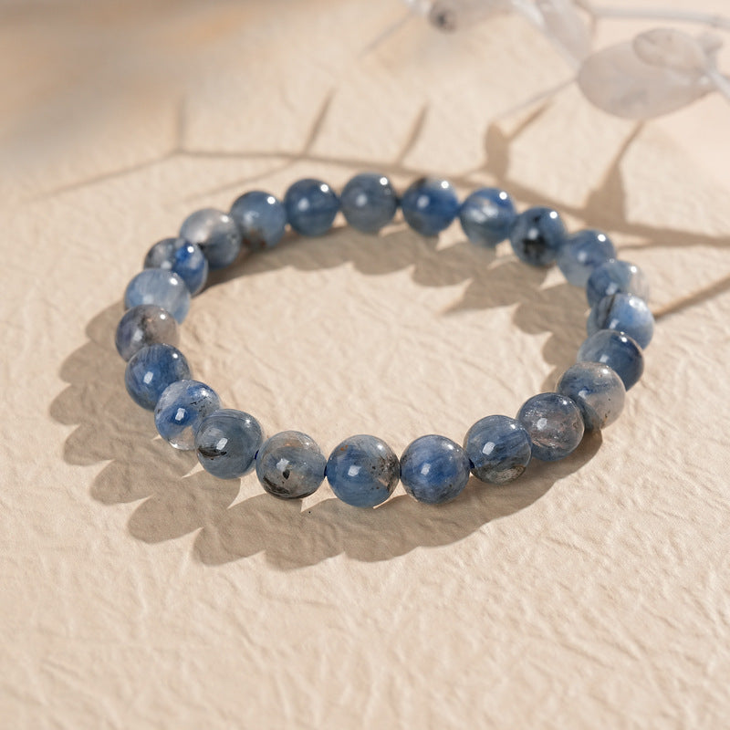 Blue crystal beaded bracelet with gold-tone spacers, shown in 6 mm and 8 mm options — Indigo Mist Crystal Bracelet by Glazenya.