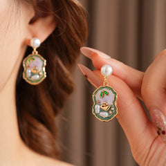 Pearl stud drop earrings with lilac and green enamel cameo and gold accents — Verdant Cameo Pearl Enamel Drops.