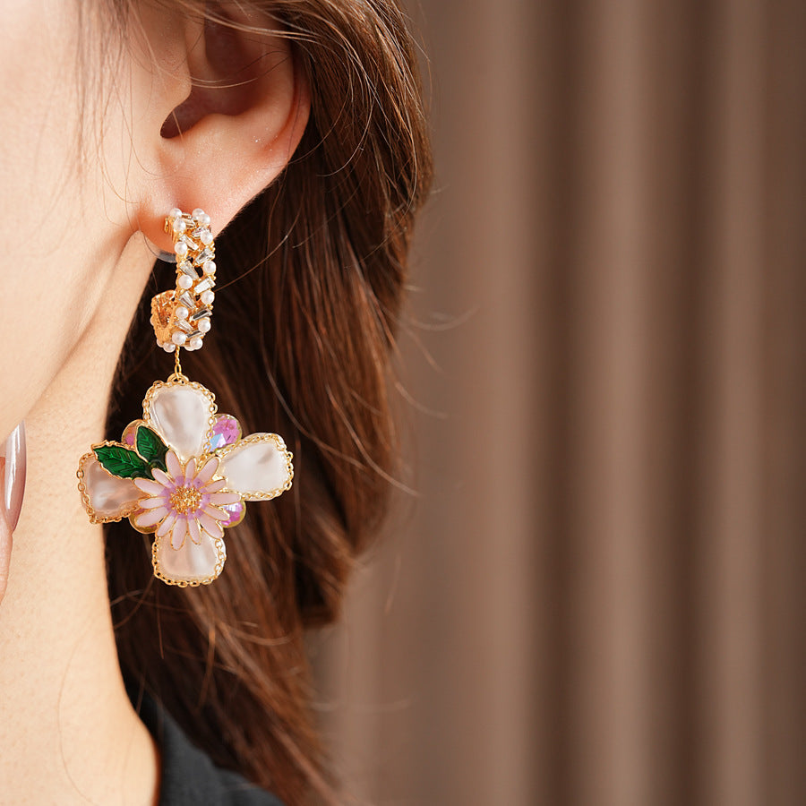 Romantic floral statement earrings with pink blossoms, imitation pearls, and enamel petals — Blossom Pearl Garden Earrings.