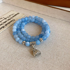 Multi-layer bracelet with crystal medallion and pearl beads in chic style