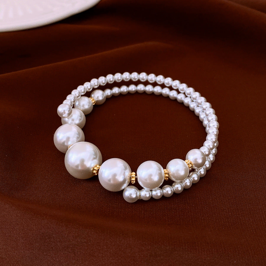 Glazenya Irregular Cross Pearl Choker — close-up of cross motif and pearls