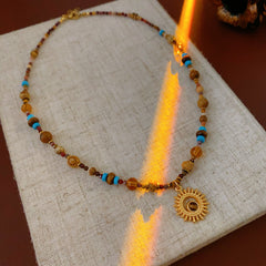 Sun pendant beaded necklace collection — multiple styles displayed