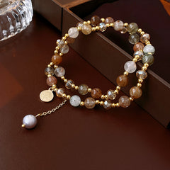 Multi-layer bracelet with crystal medallion and pearl beads in chic style
