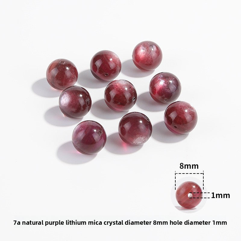 Lepidolite-in-Quartz crystal round beads with berry-pink striations, assorted 8–15 mm.