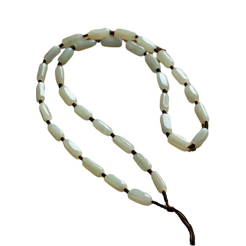Handcrafted pendant cords wrapped with natural Hetian jade tube beads in light and dark brown — Snowglow Hetian Jade Pendant Cord.