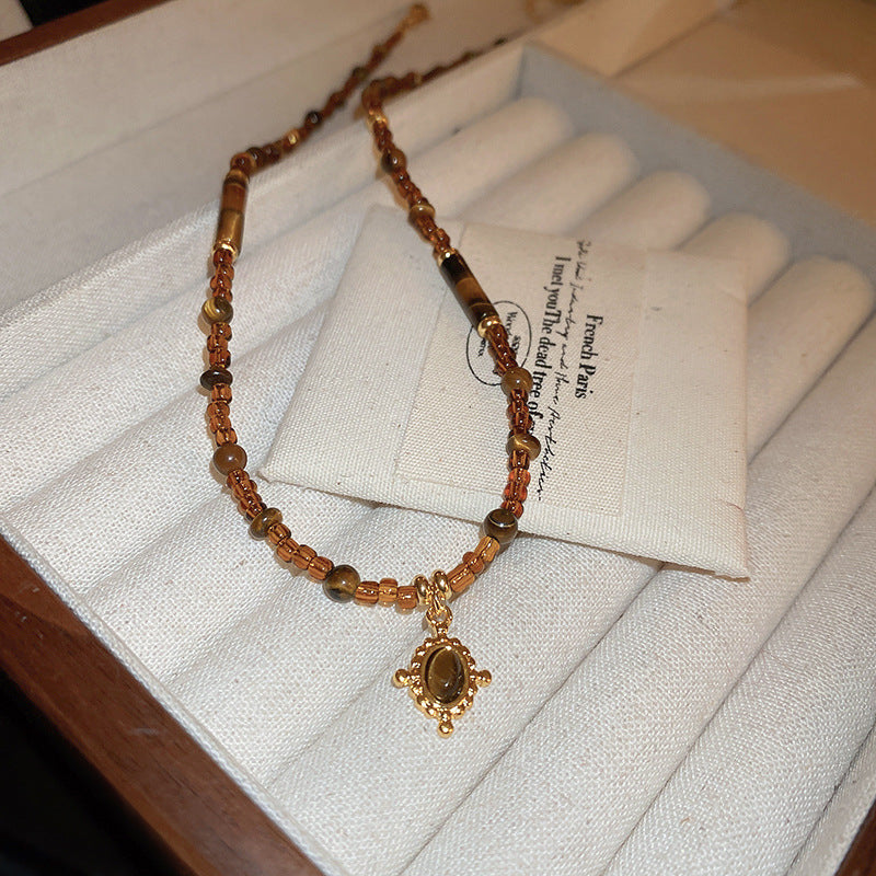 Sun pendant beaded necklace collection — multiple styles displayed