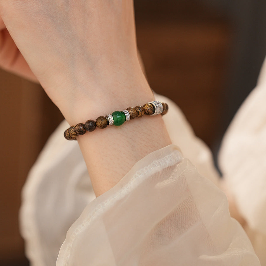 Natural agarwood beaded bracelet with green agate centerpiece and pavé spacers — Verdant Agarwood Bracelet by Glazenya.