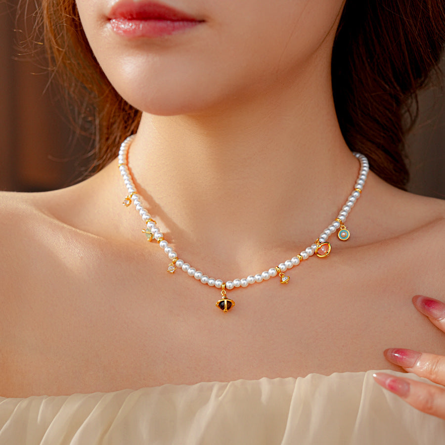 Fleur de Pearl Luxe Set with pearl necklace and matching zircon-accented bracelet, elegant and romantic