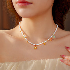 Fleur de Pearl Luxe Set with pearl necklace and matching zircon-accented bracelet, elegant and romantic