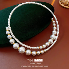 Glazenya Irregular Cross Pearl Choker — close-up of cross motif and pearls